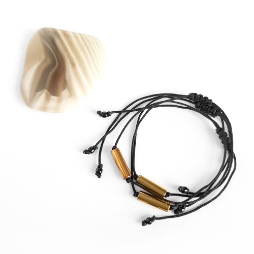 Bransoletka złoty hematyt patyczek na czarnym sznurku Gold stick