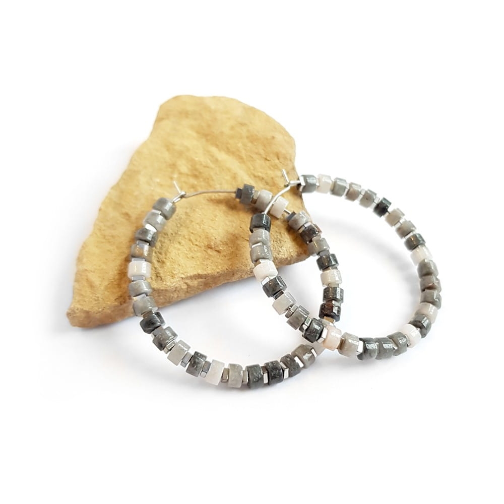 Kolczyki wiszące koła orle oko, hematyt i stal chirurgiczna