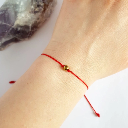 WishYouLuck złoty hematyt bransoletka szczęścia na czerwonym sznurku